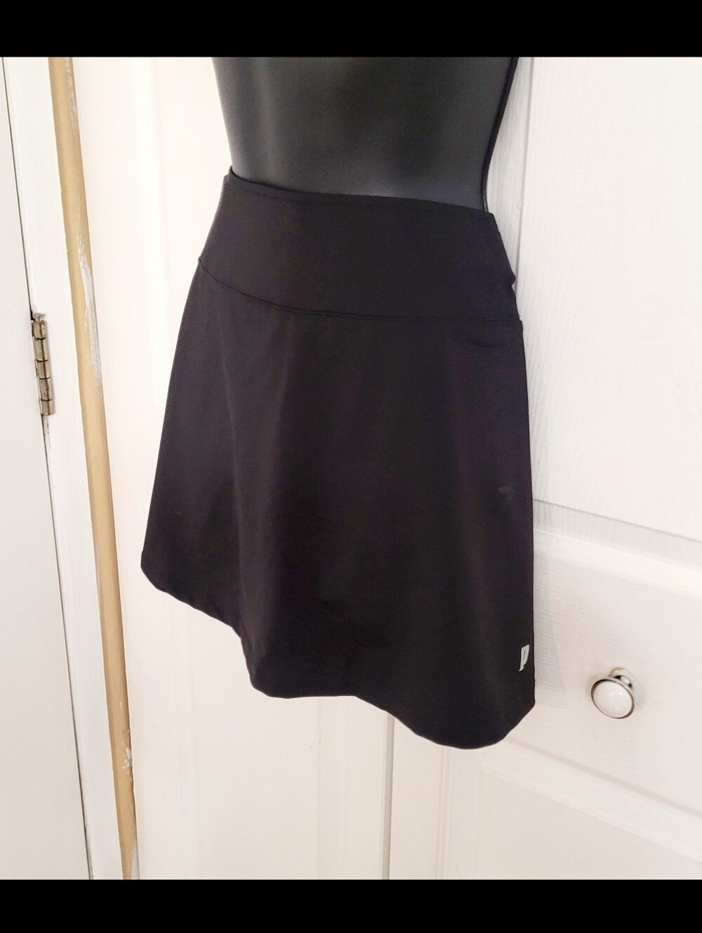 Prince black tennis skirt with built-in shorts. Size M